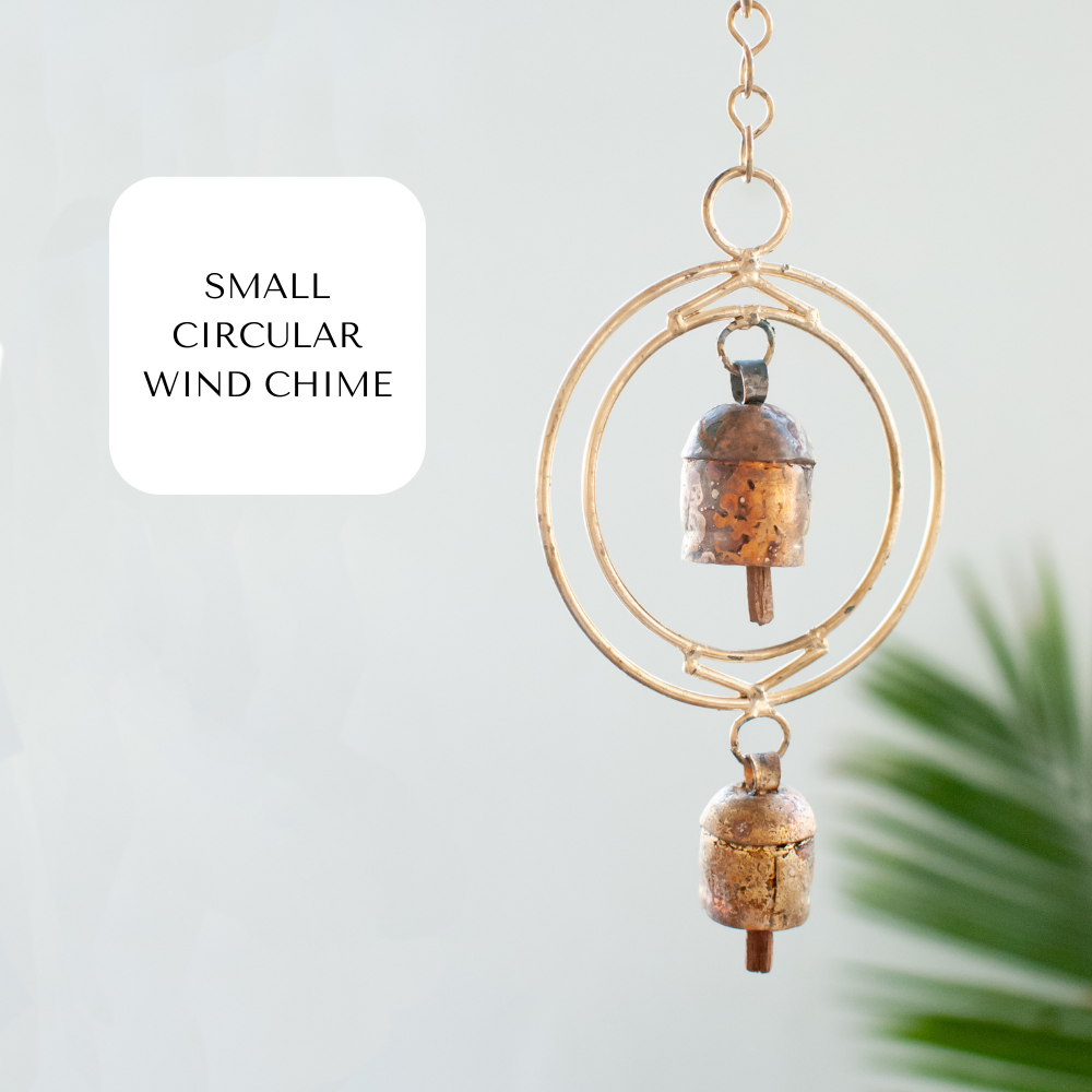 A close-up of a wind chime on the right with a text box with "small circular wind chime" on the left.