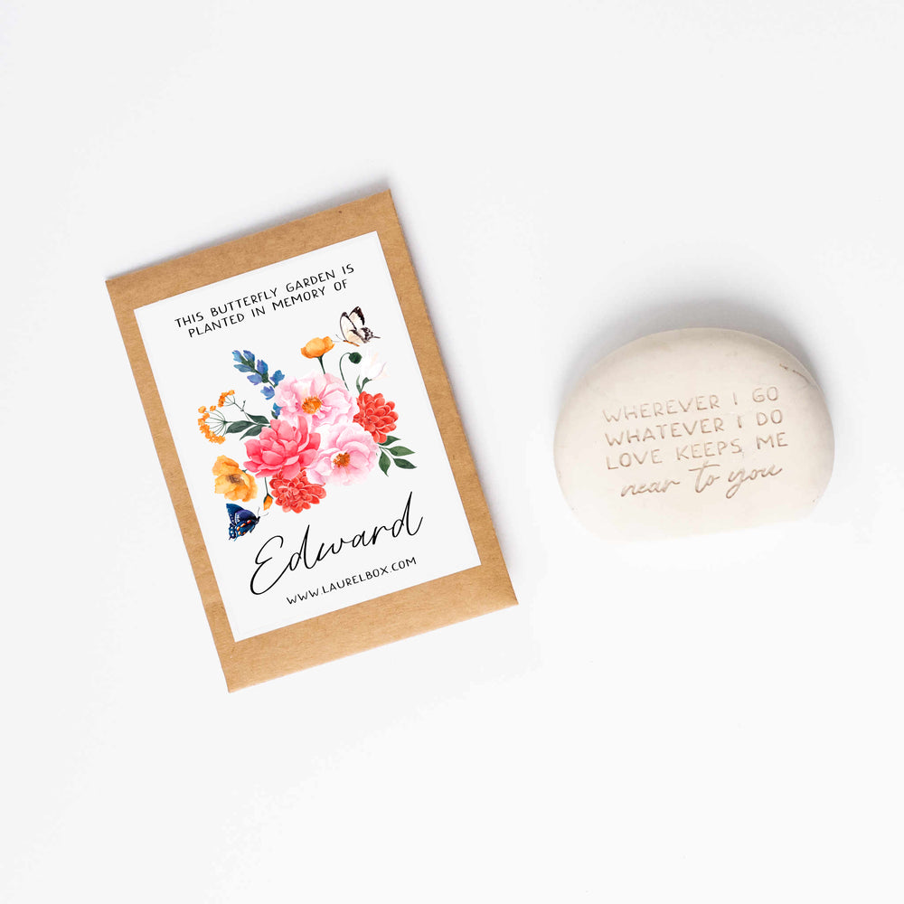 photo of a butterfly garden seed packet next to a memorial garden stone