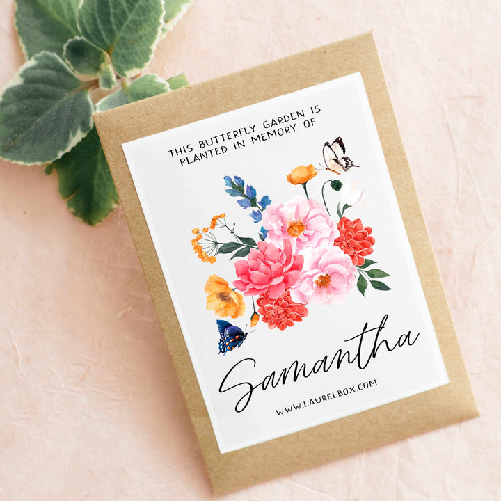 photo of a packet of flower seeds with the words "This butterfly garden is planted in memory of" at the top in black letters, above an image of multi colored flowers and "Samantha" displayed below the flowers