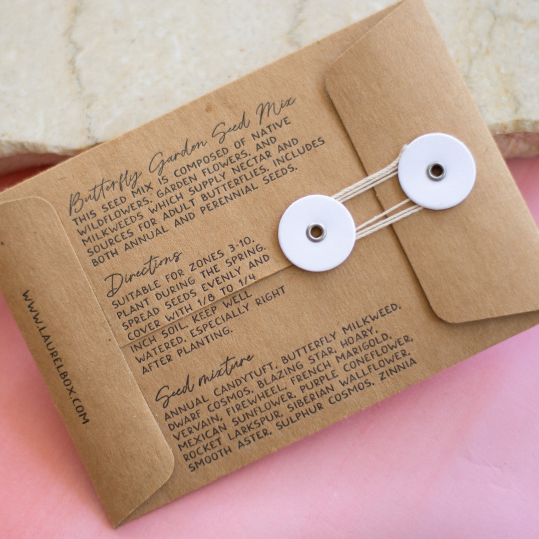 photo of the back of the butterfly garden seed packet with the seed mix composition, directions and seed mixture details listed out