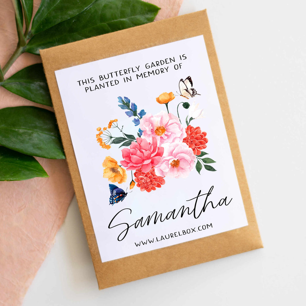 photo of a packet of flower seeds with the words "This butterfly garden is planted in memory of" at the top in black letters, above an image of multi colored flowers and "Samantha" displayed below the flowers