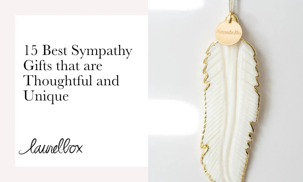A white leaf-shaped pendant with gold edges and a small gold tag engraved with "Annabelle". 15 Best Sympathy Gifts That Are Both Unique and Thoughtful.