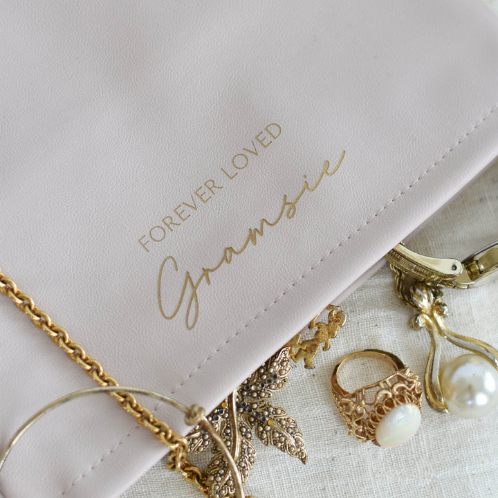 Personalized Memorial Clutch in soft pink vegan leather with "Forever Loved" and "Gramsie" engraved in gold.