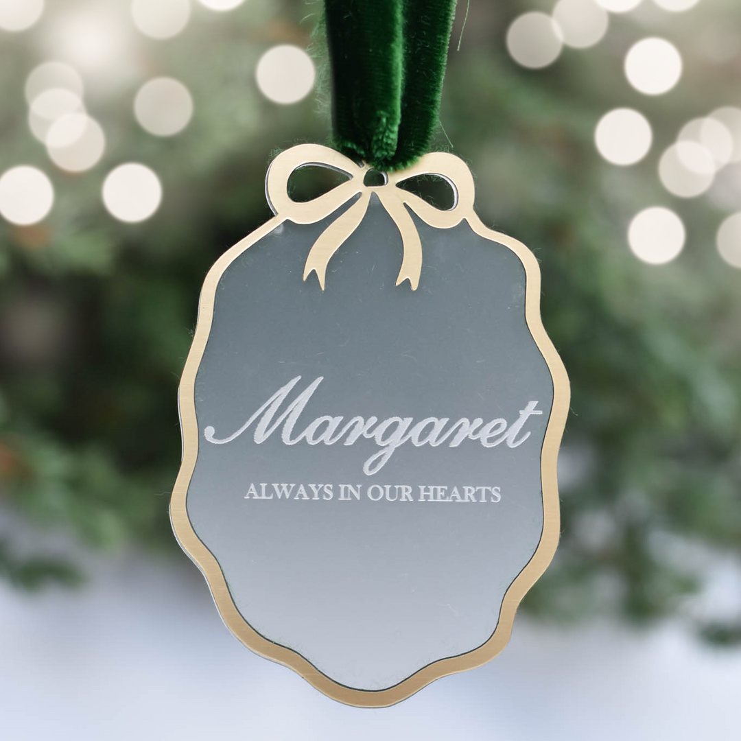 Their Name, Always Custom Memorial Ornament in frosted acrylic with gold trim, engraved 'Margaret' and 'ALWAYS IN OUR HEARTS.'