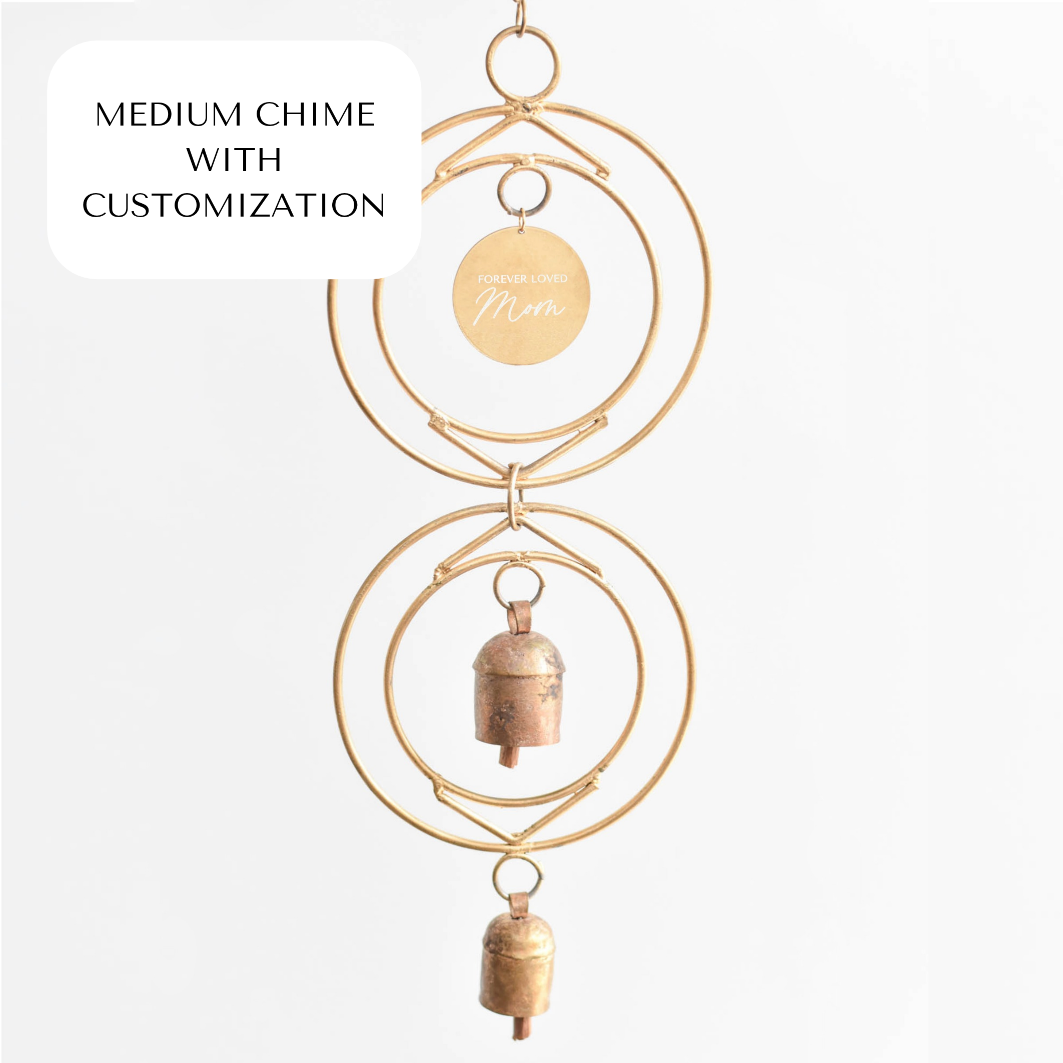 Medium chime with customization, features gold rings and two bronze bells, engraved tag reading 'Forever Loved Mom'.
