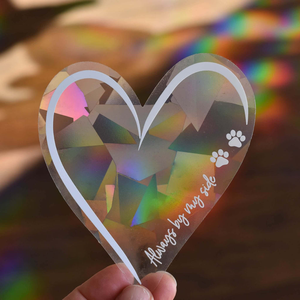 Always by My Side Pet Memorial Rainbow Decal in heart shape, clear prismatic material with white text and paw prints.