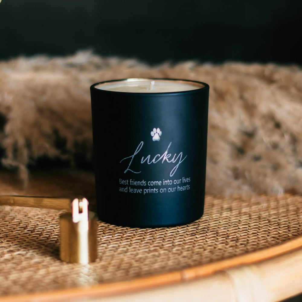 Pet Memorial Engraved Frame and Candle Gift with black candle engraved "Lucky" and paw print, text below reads sentimental phrase.