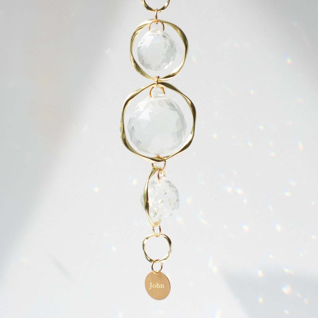Custom Memorial Sun Catcher and Rainbow Maker with clear crystals and a gold charm engraved with &