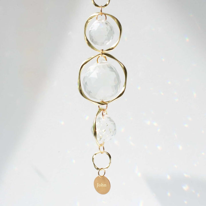 Custom Memorial Sun Catcher and Rainbow Maker with clear crystals and a gold charm engraved with &