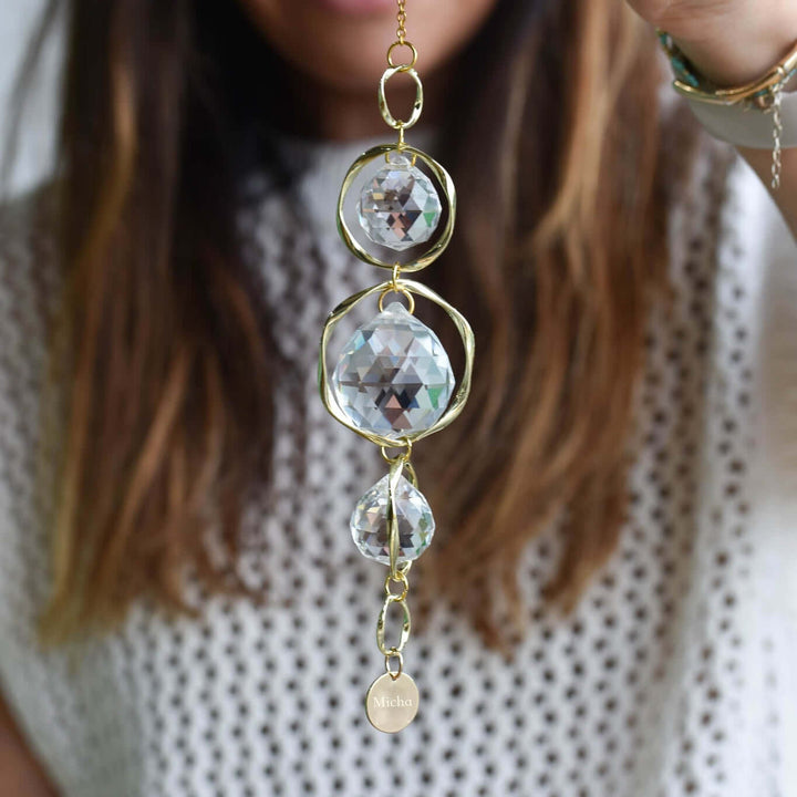 Custom Memorial Sun Catcher and Rainbow Maker featuring three faceted glass crystals in gold frames and engraved charm.