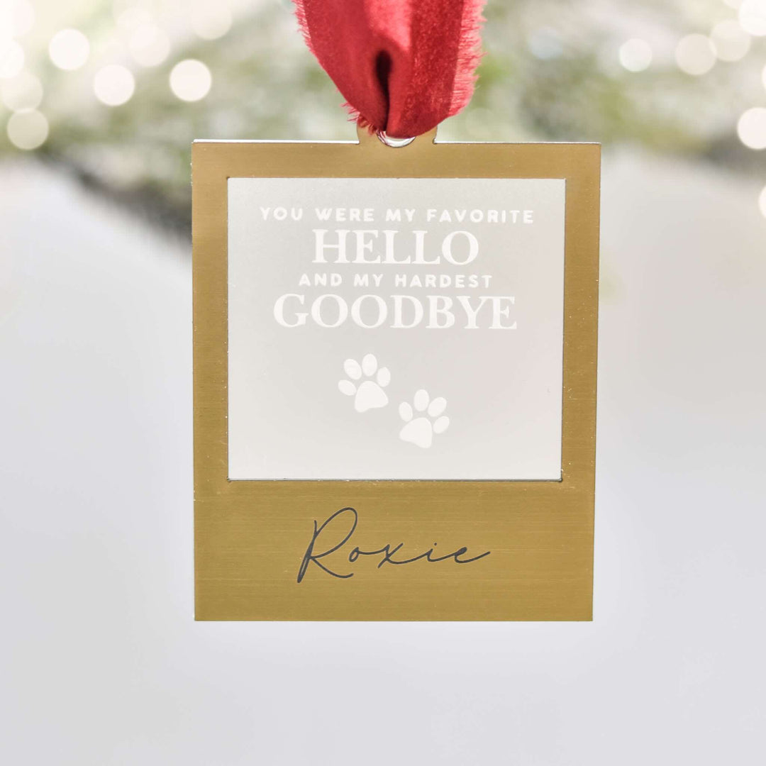 Favorite Hello Pet Memorial Ornament, gold frame, etched text, paws, red ribbon, personalized with name Roxie.