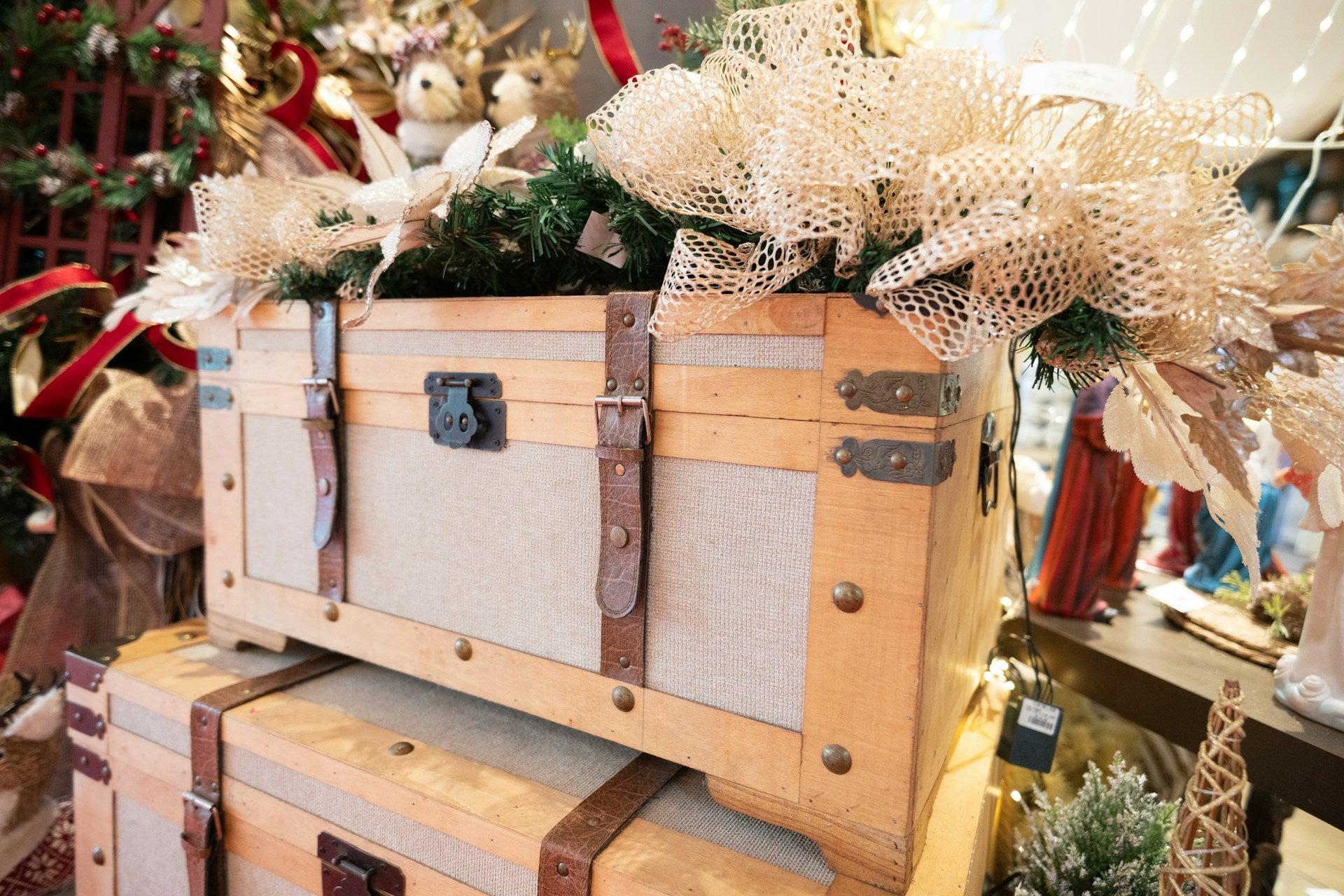 Decorative wooden trunk with festive decorations in a Christmas setting