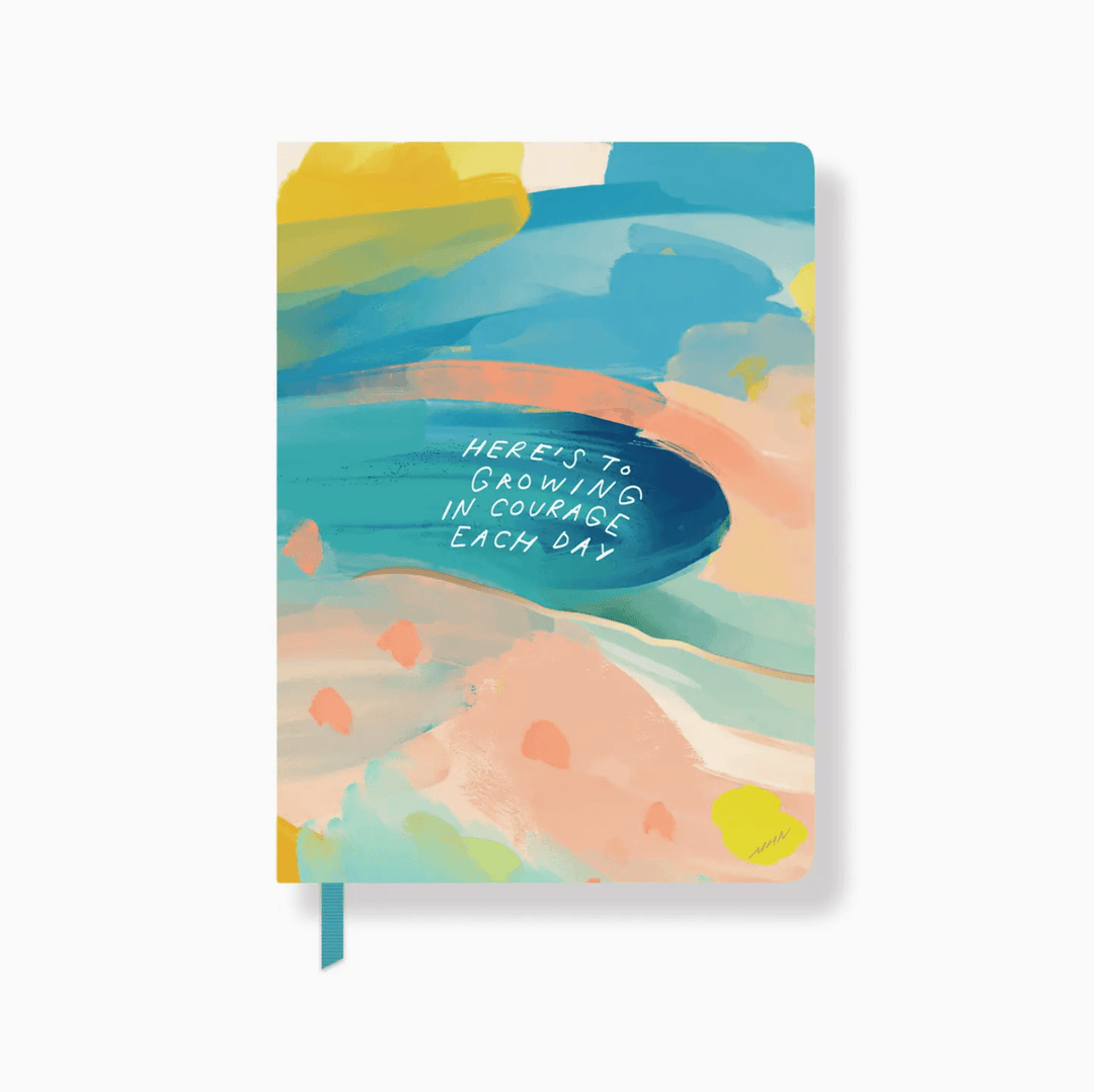 One Day at a Time Journal with a colorful cover featuring the phrase &