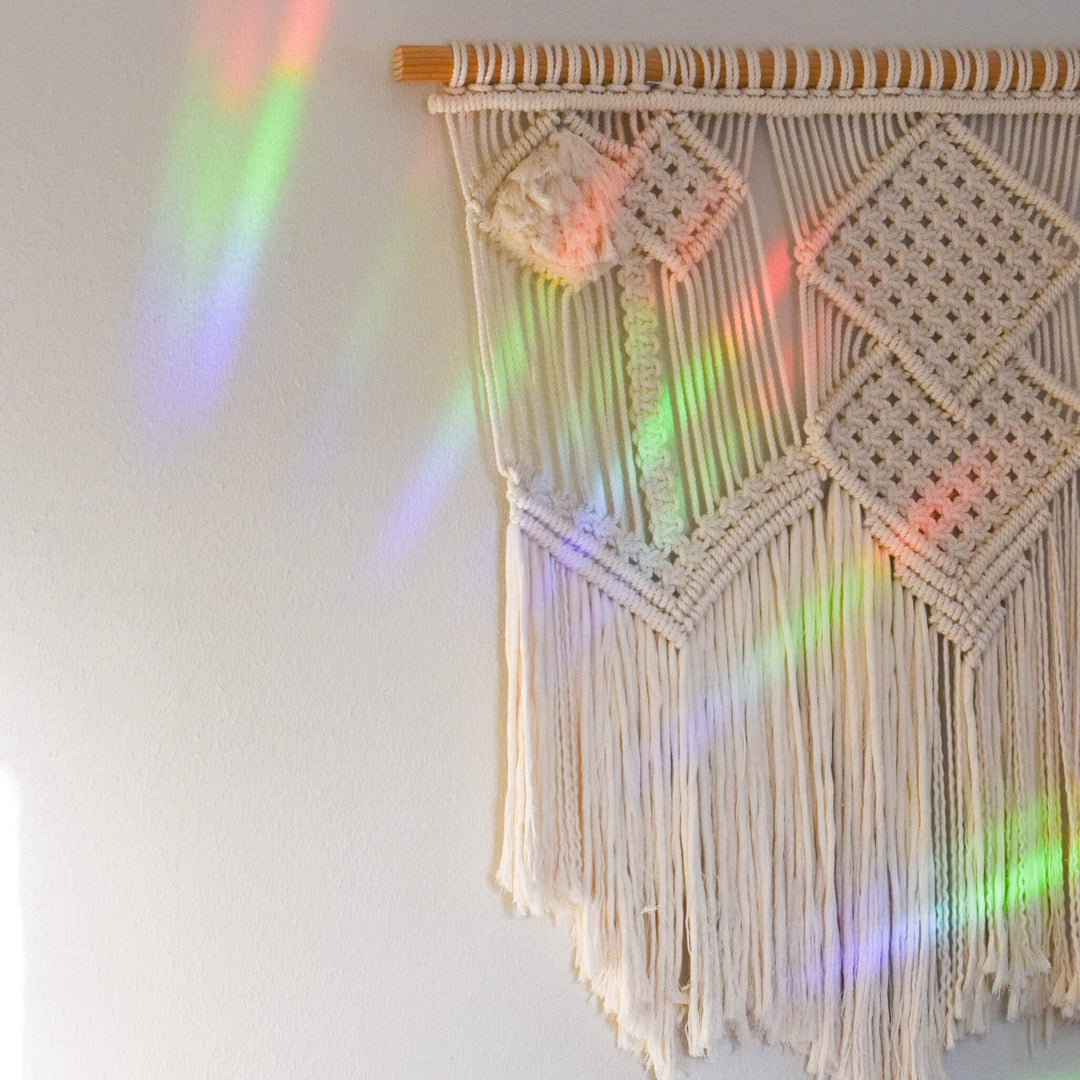 Always by My Side Pet Memorial Rainbow Decal, clear prismatic material casting rainbow light on a wall.