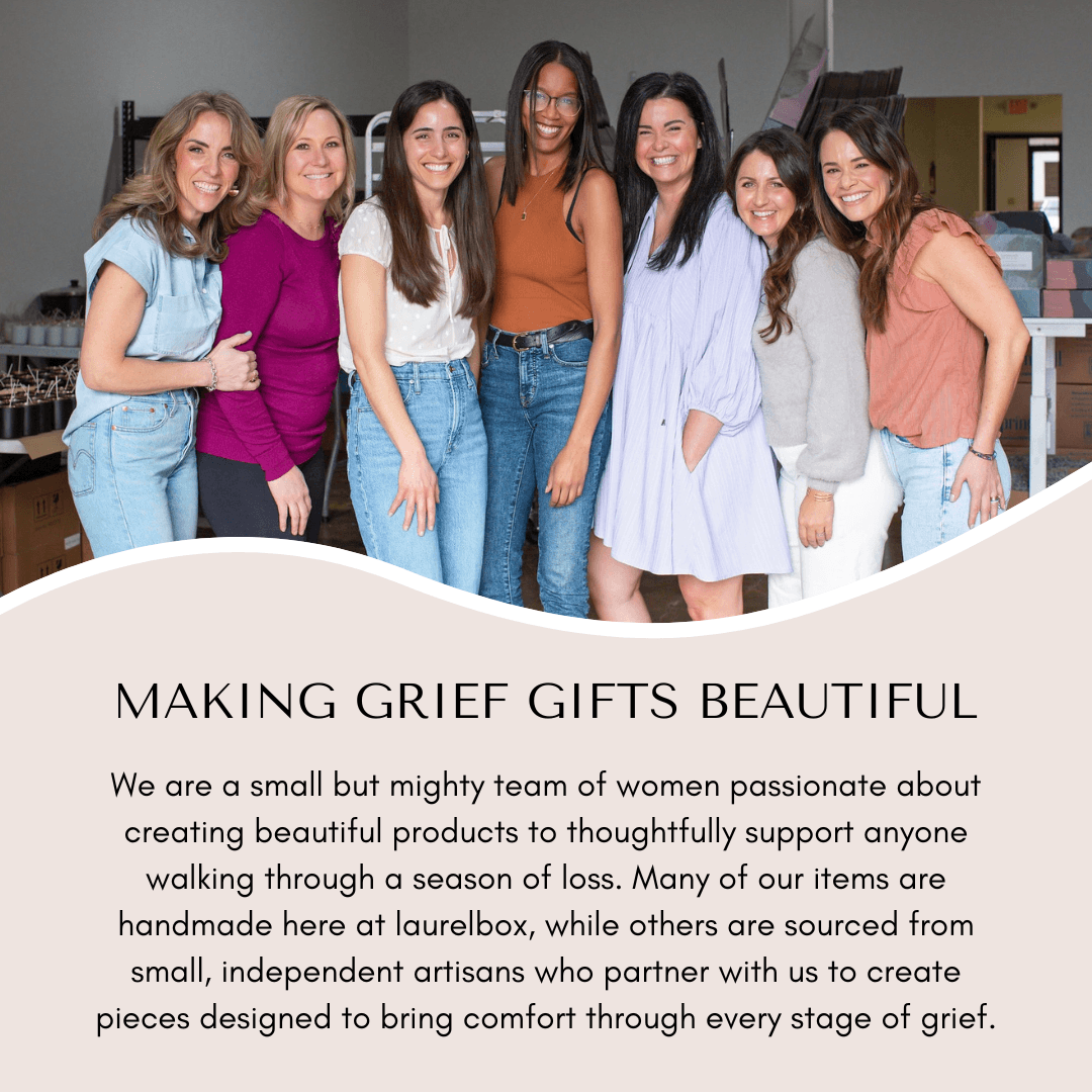 Group of women standing together in casual attire, smiling, indoors, promoting grief gift products.
