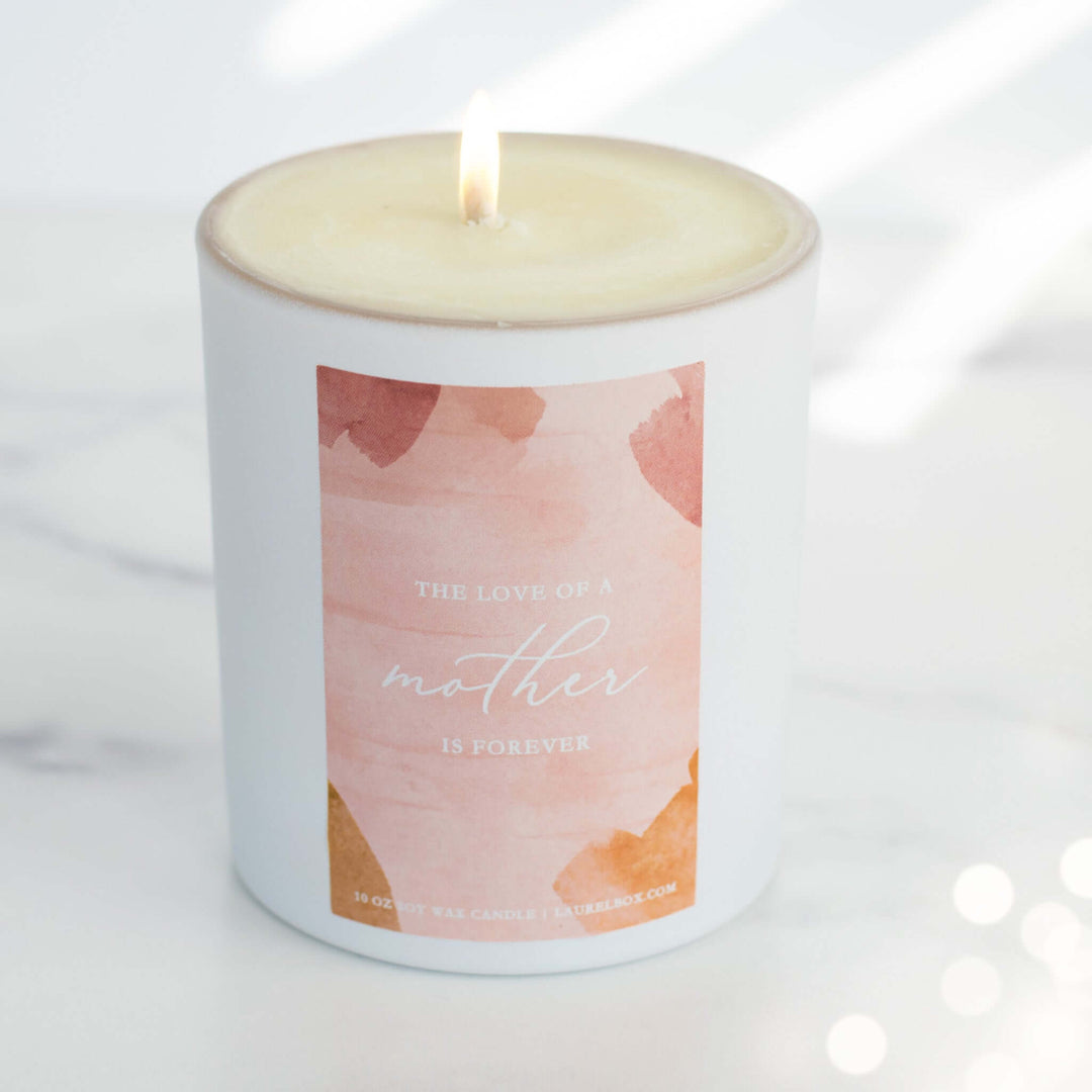 I’ll Always Love You, Mom candle with a white container, pastel label reading &
