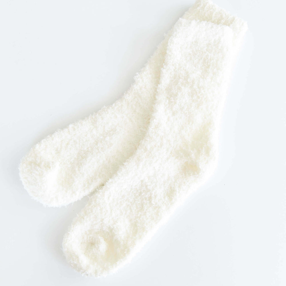 Super Soft Socks in off-white, made from fuzzy microfiber knit, showing soft texture and cozy design.
