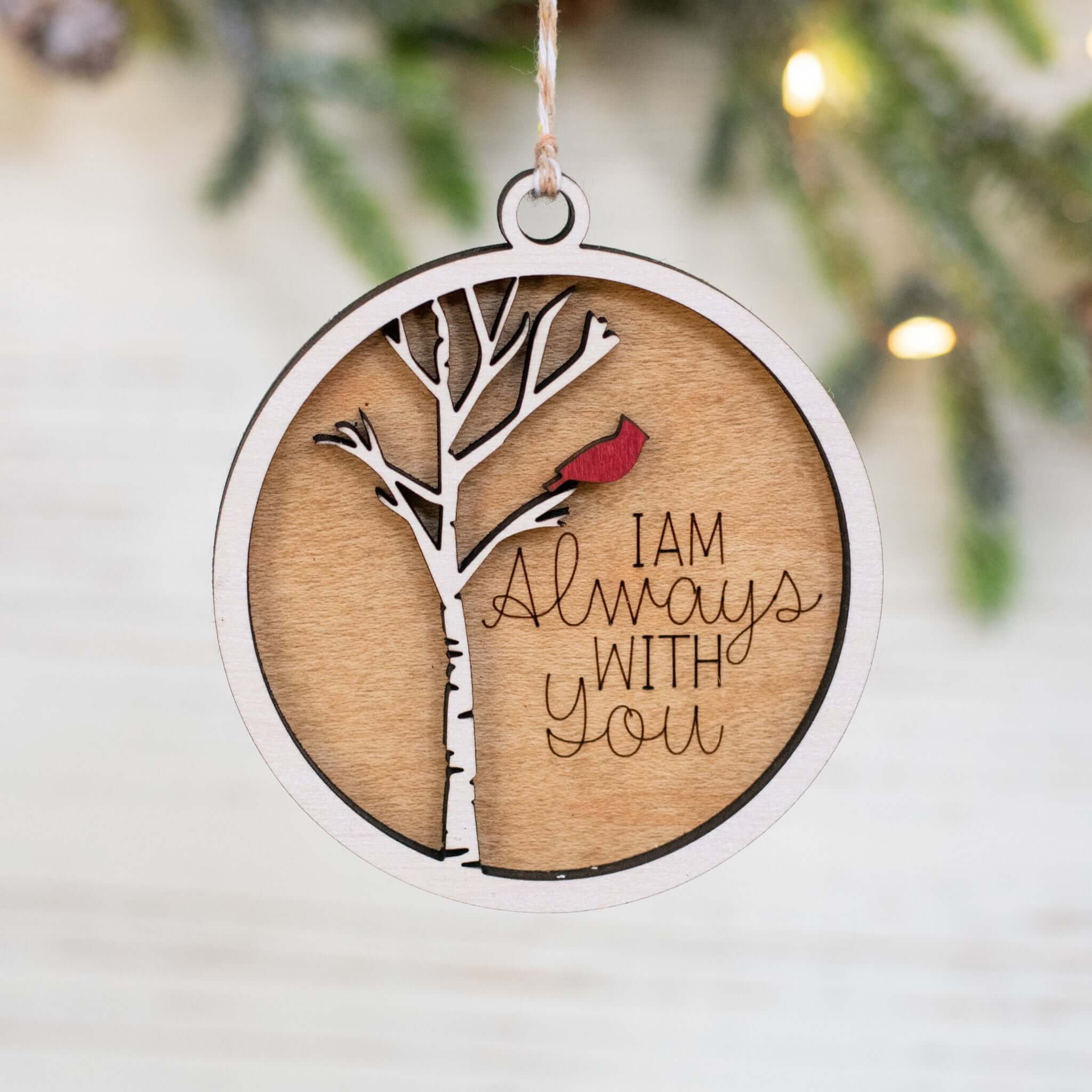 Wooden round ornament with a tree design, red cardinal, and text reading 'I AM ALWAYS WITH YOU'. Sympathetic gift.