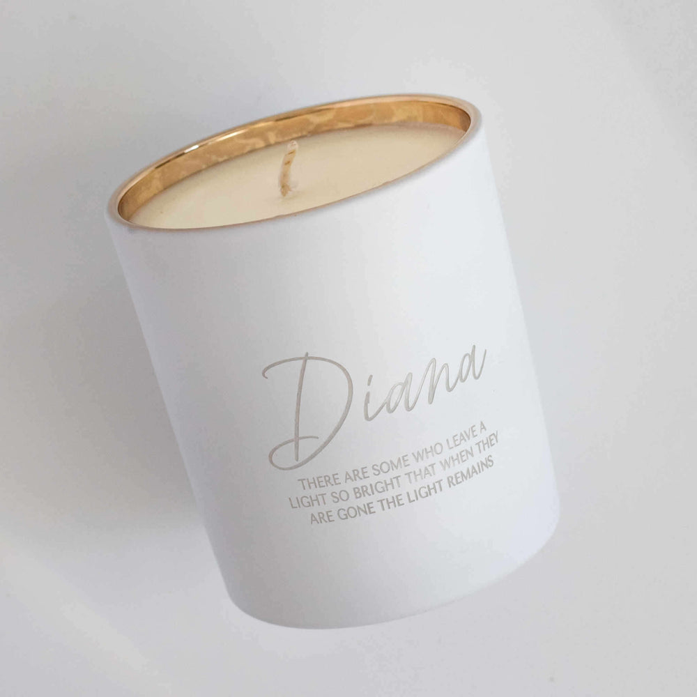 Their Light Remains Candle in white with gold rim, engraved with the name Diana and memorial quote.